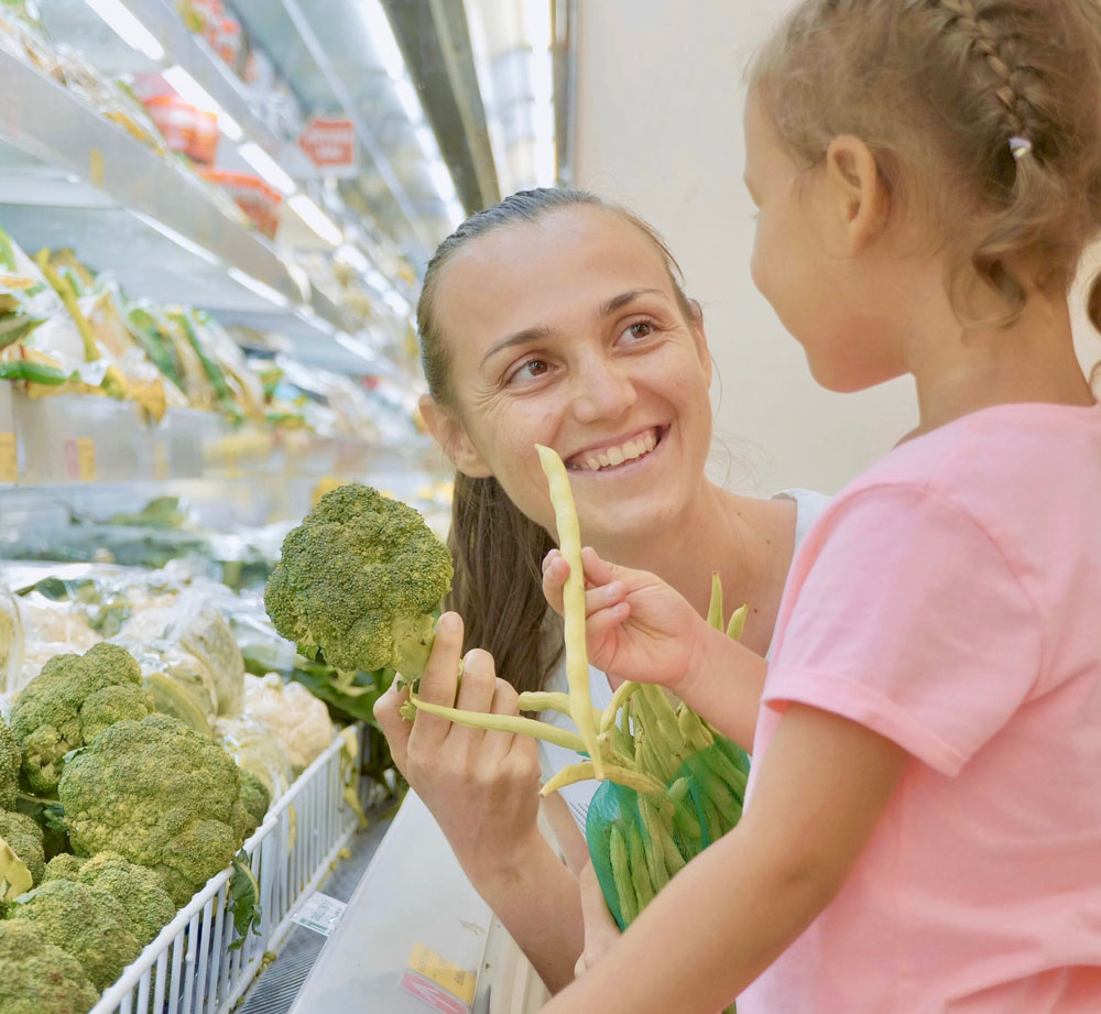 young girl are smiling at each other
