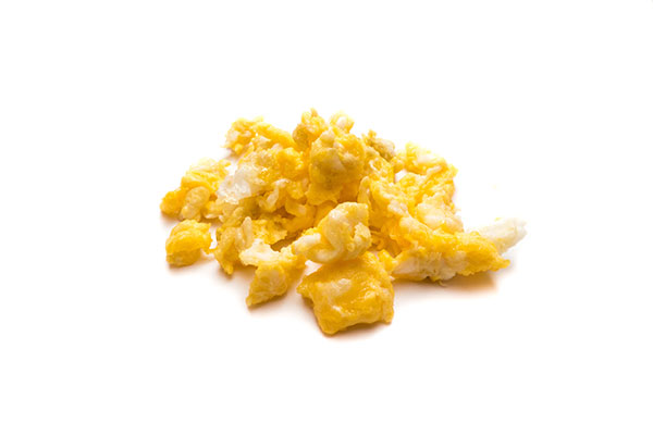 Scrambled eggs on a white background.
