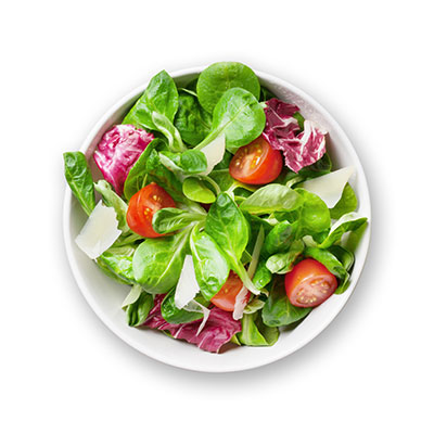 Fresh salad with spinach, cherry tomatoes, and cheese.